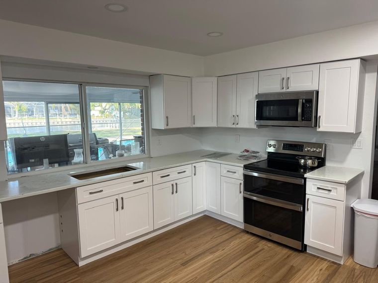 Kitchen remodel with white cabinetry